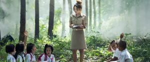 Taiwanese teacher teaching students in nature