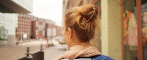 blonde woman looking away from the camera