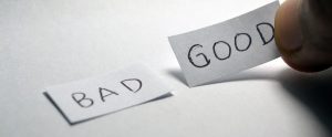 two paper notes with the word "bad" and "good" on them