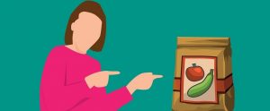 cartoon woman pointing to a brown lunch bag