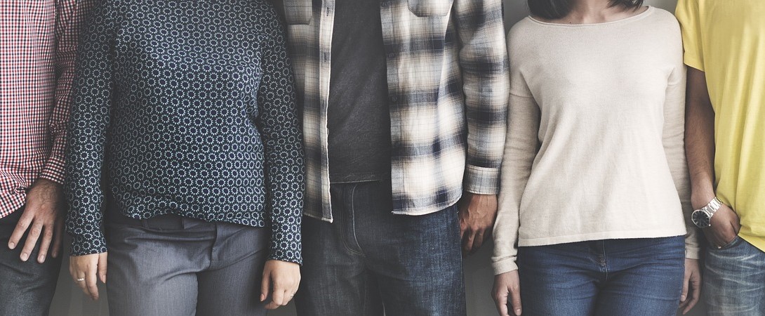 group of diverse people standing in a line