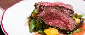 a rare steak on a plate