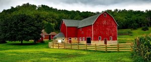 a red farm in the country side
