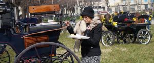 elderly woman wearing a fur coat