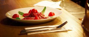 fine cuisine with tomato sauce and tomatoes