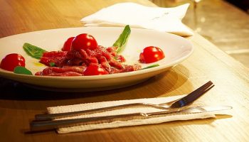 fine cuisine with tomato sauce and tomatoes