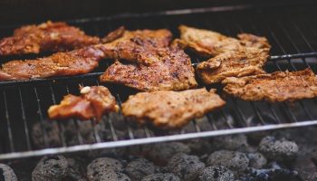 cooked pork on a grill