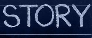 the word "STORY" chalked on a board