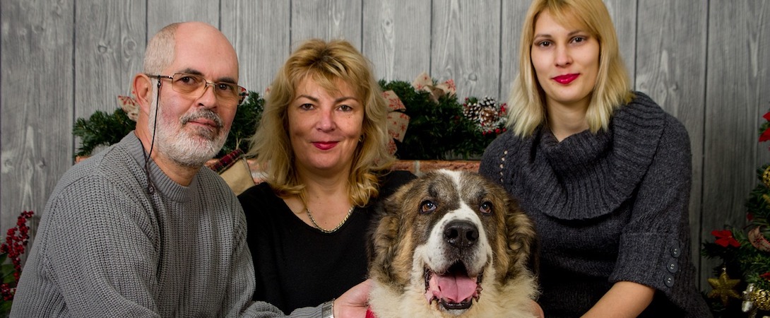 a family of three and their dog