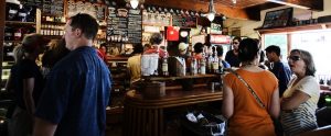 crowd of people in a pub