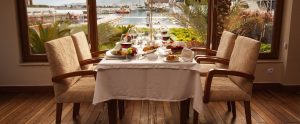 a fancy restaurant with a beach view