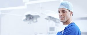 a doctor in blue scrub uniform