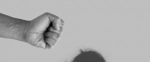 closed fist in a violent pose