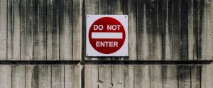 a red sign stating "DO NOT ENTER"