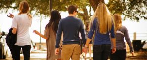 group of youths walking outside