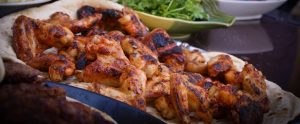 cooked chicken on chapati bread