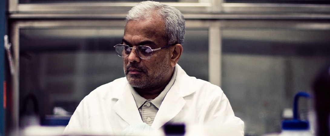 scientist wearing a white lab coat