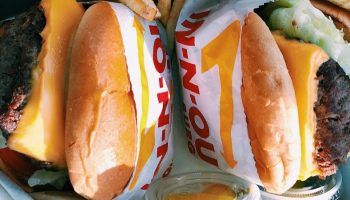 fast food burgers in a carton