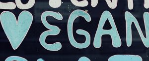 the word "Vegan" written in marker on a border