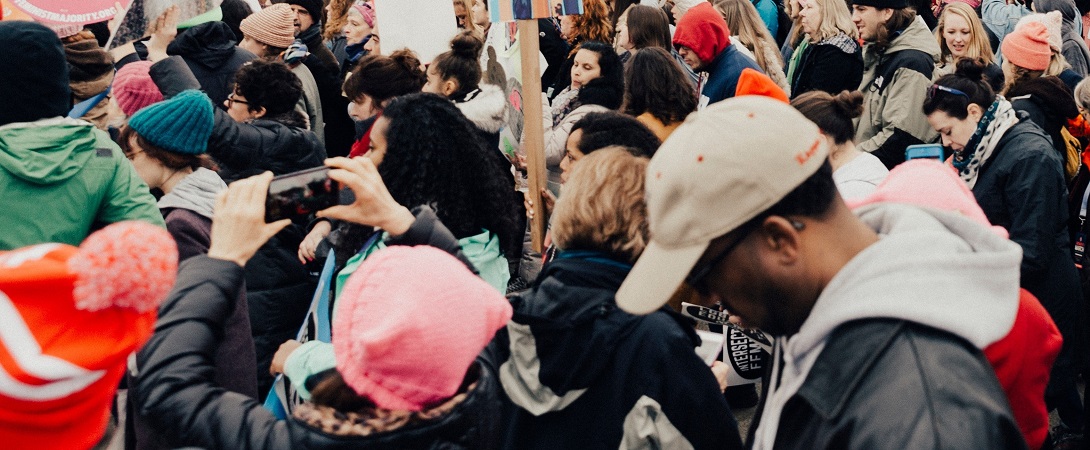 a crowd of people protesting