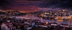 a Portugese city in the nighttime