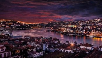a Portugese city in the nighttime