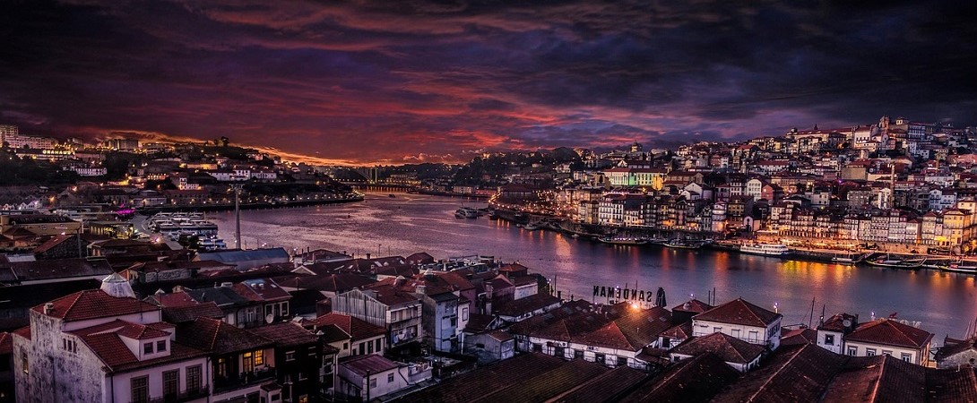 a Portugese city in the nighttime