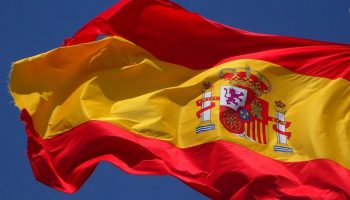 a Spanish flag waving in the wind