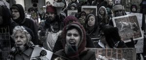animal advocates protesting against fur in a march