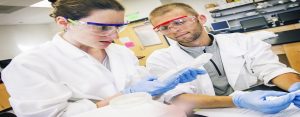 two researchers working on biotechnological advacements
