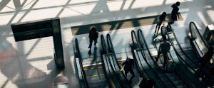 aerial view of people going up and down an escalator