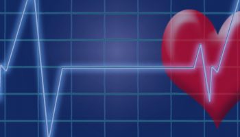 cartoon heart behind a heart rate monitor