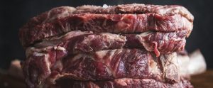 slabs of raw meat stacked on top of each other