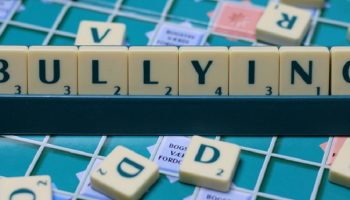 the word "Bullying" made by scrabble