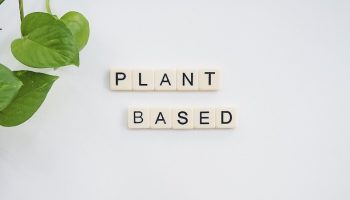 words "Plant Based" spelt out with scrabble pieces
