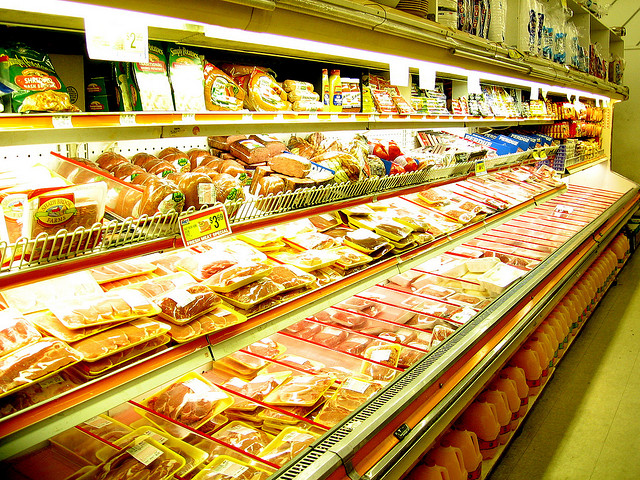 packaged meat section in a grocery store