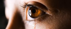 close up of an eye crying