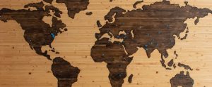 wooden map with pins