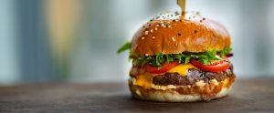 burger on wooden surface