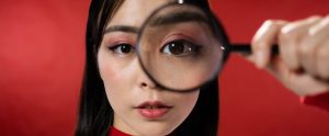 chinese woman magnifying glass