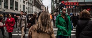 people walking through crosswalk