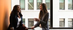 women-discussing-something-at-an-office