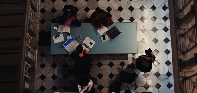 people studying in a library