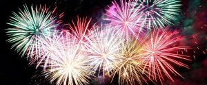 colorful fireworks exploding in night sky