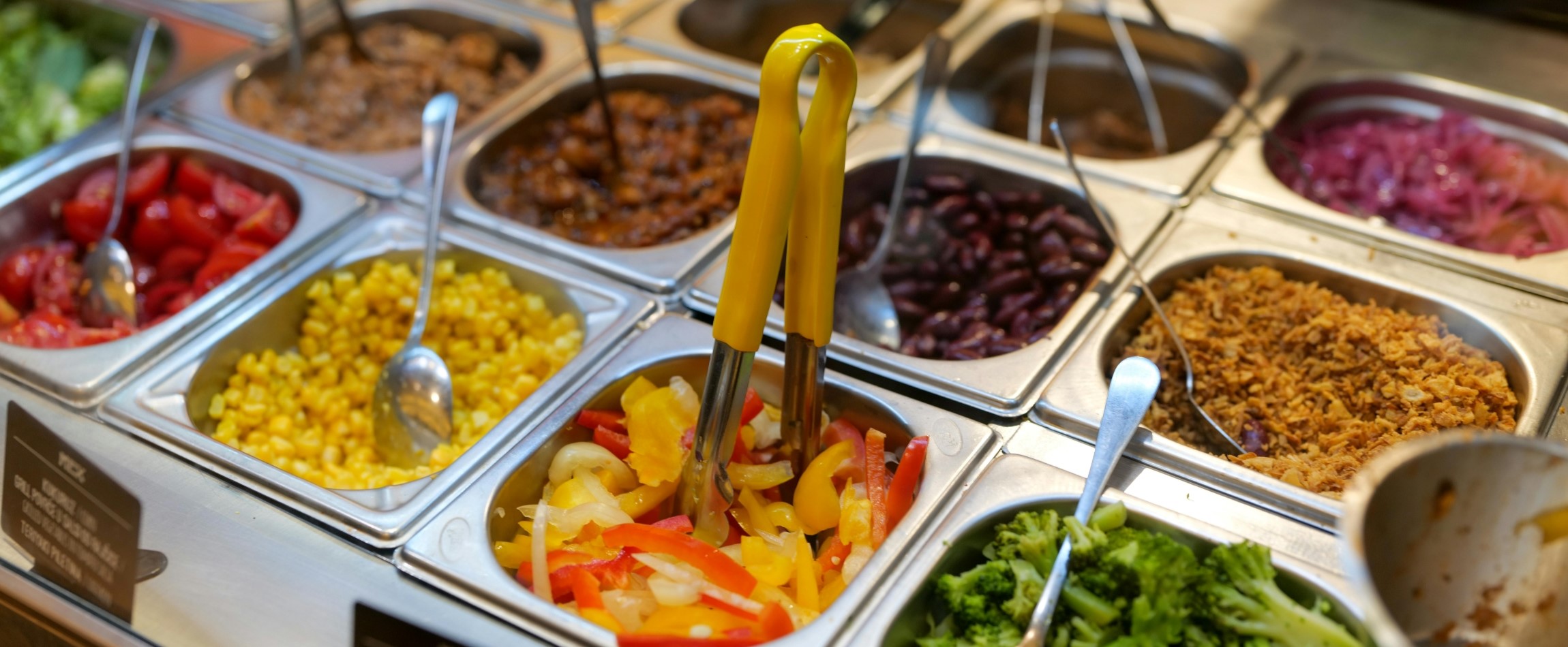 self-serve buffet dishes meat and vegetables