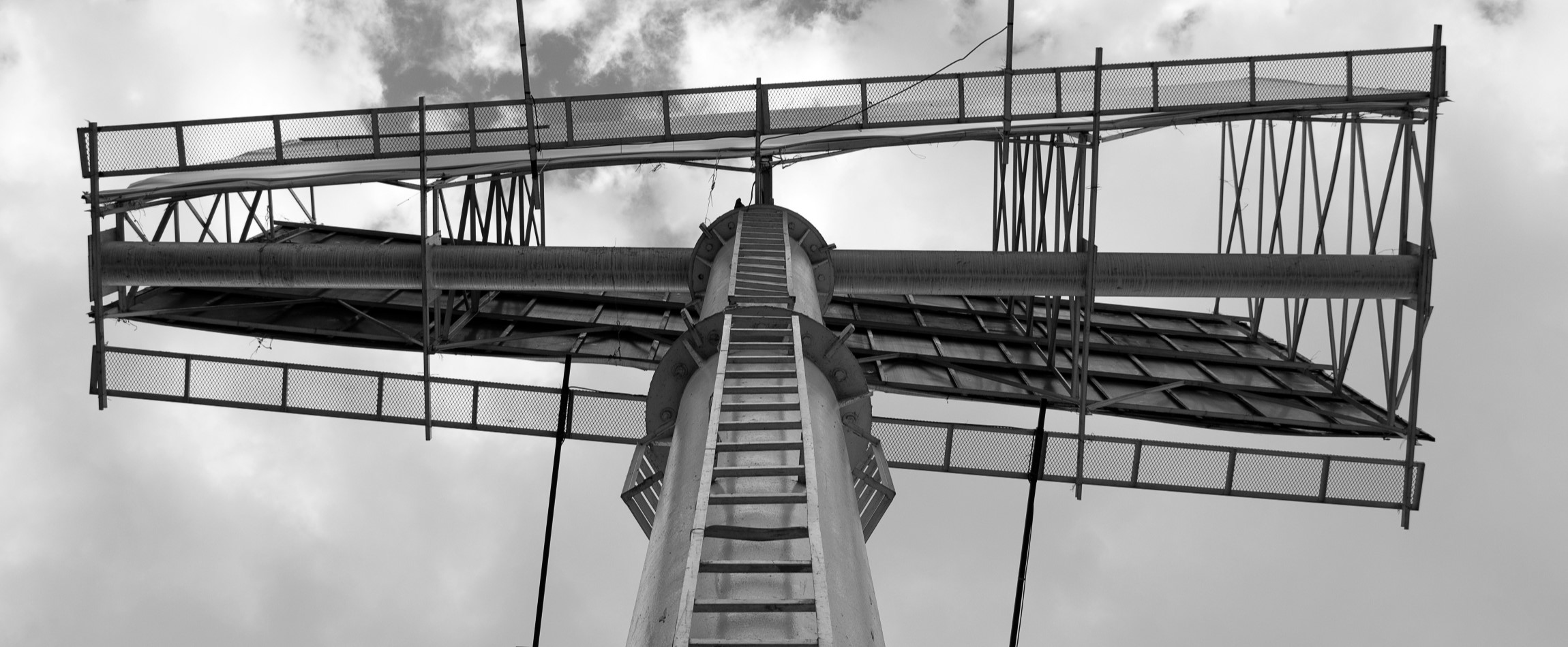 view of billboard from underneath black and white