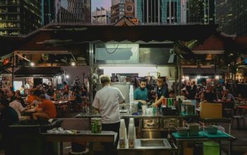 people eating in hawker center Singapore