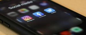 close-up of social media icons on phone screen