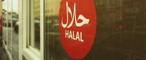 red halal sign in window