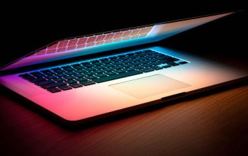 open laptop dark desk